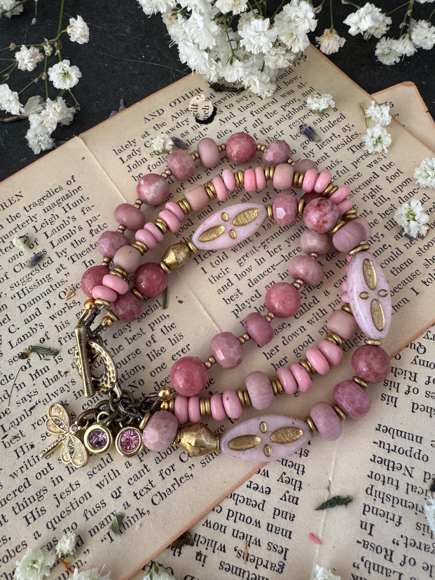 Pink Rhodonite, pink Indonesian glass, Czech glass, African brass, bracelet. Rhinestone, opal charms.