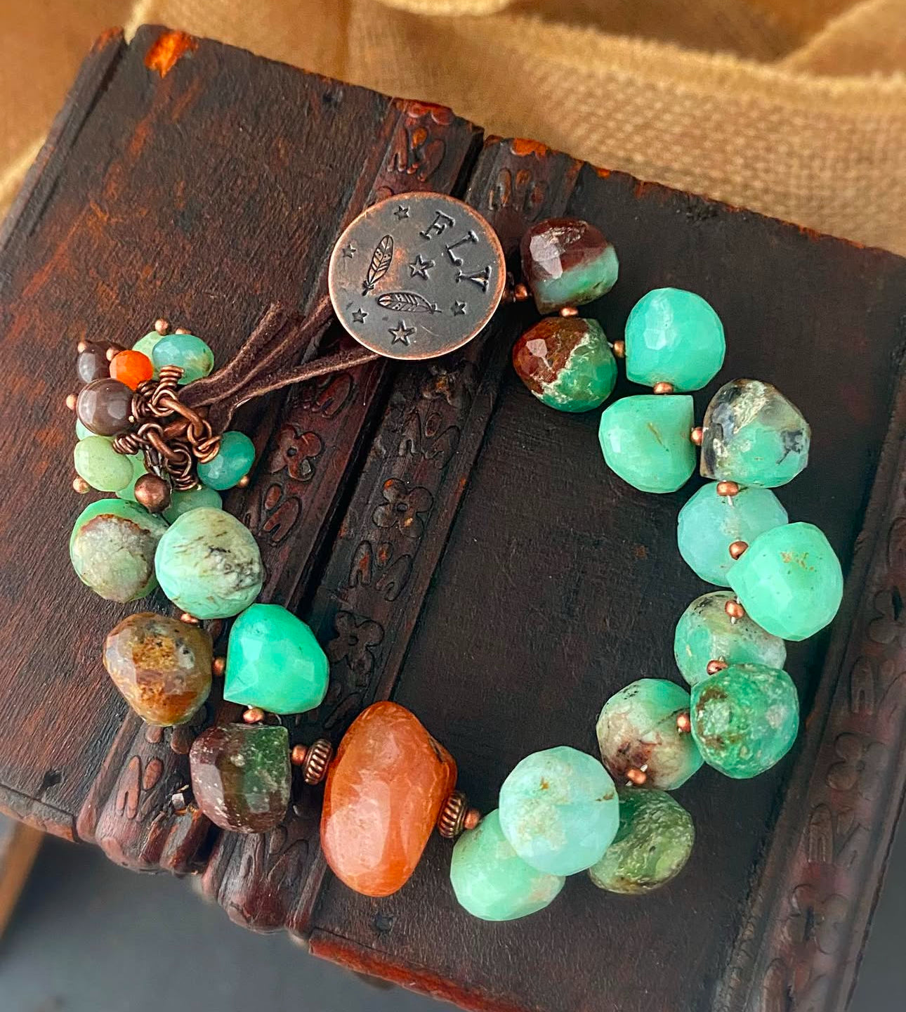 Chrysoprase stone,copper metal, button, leather, bracelet.