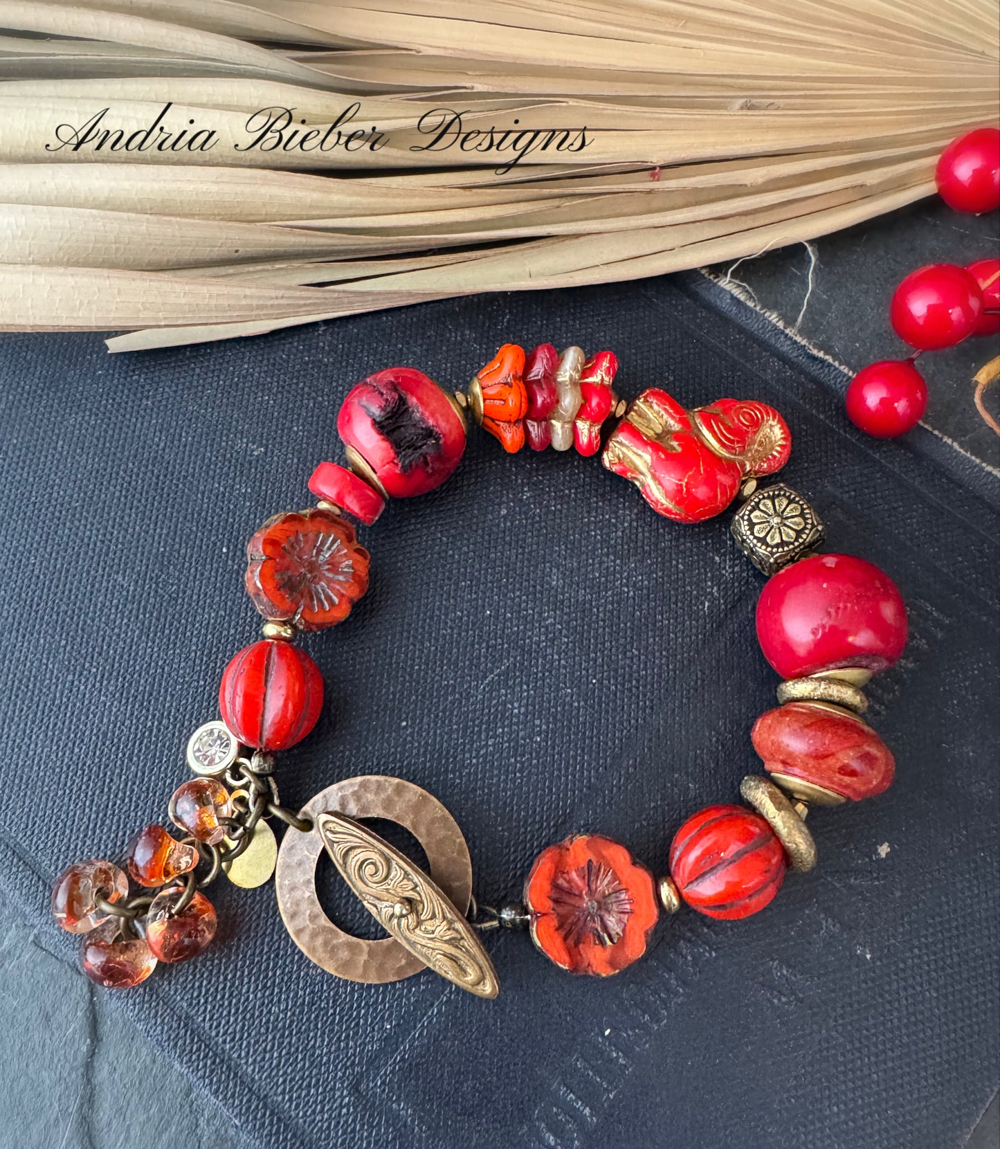 Red coral, czech glass, brass beads, button glass, bracelet.