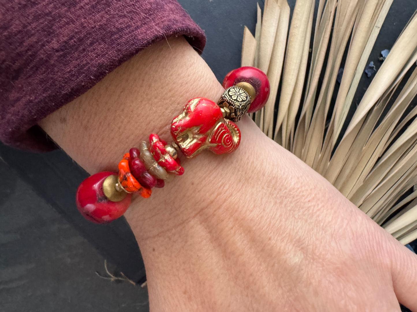 Red coral, czech glass, brass beads, button glass, bracelet.