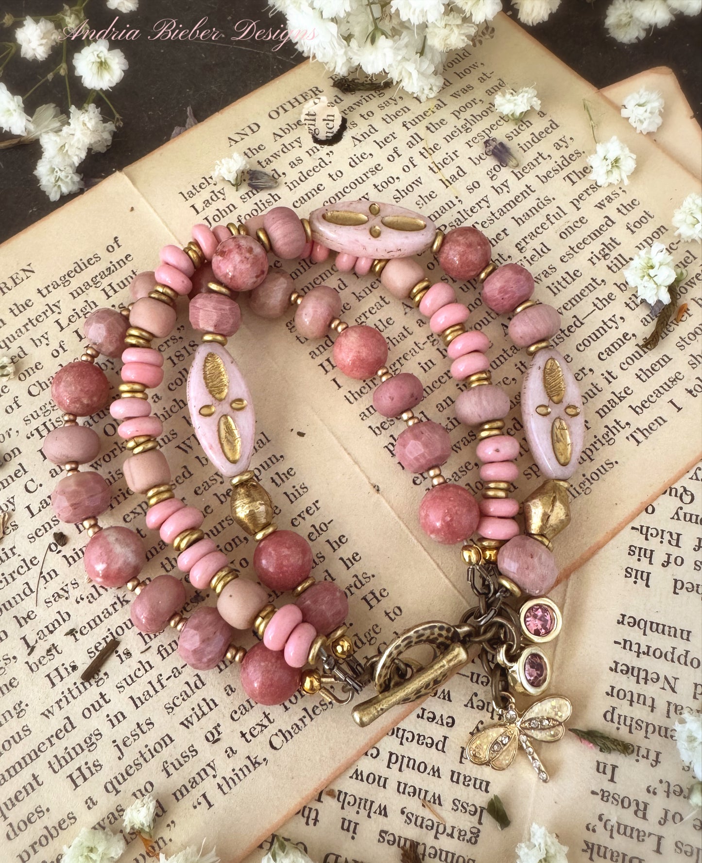 Pink Rhodonite, pink Indonesian glass, Czech glass, African brass, bracelet. Rhinestone, opal charms.