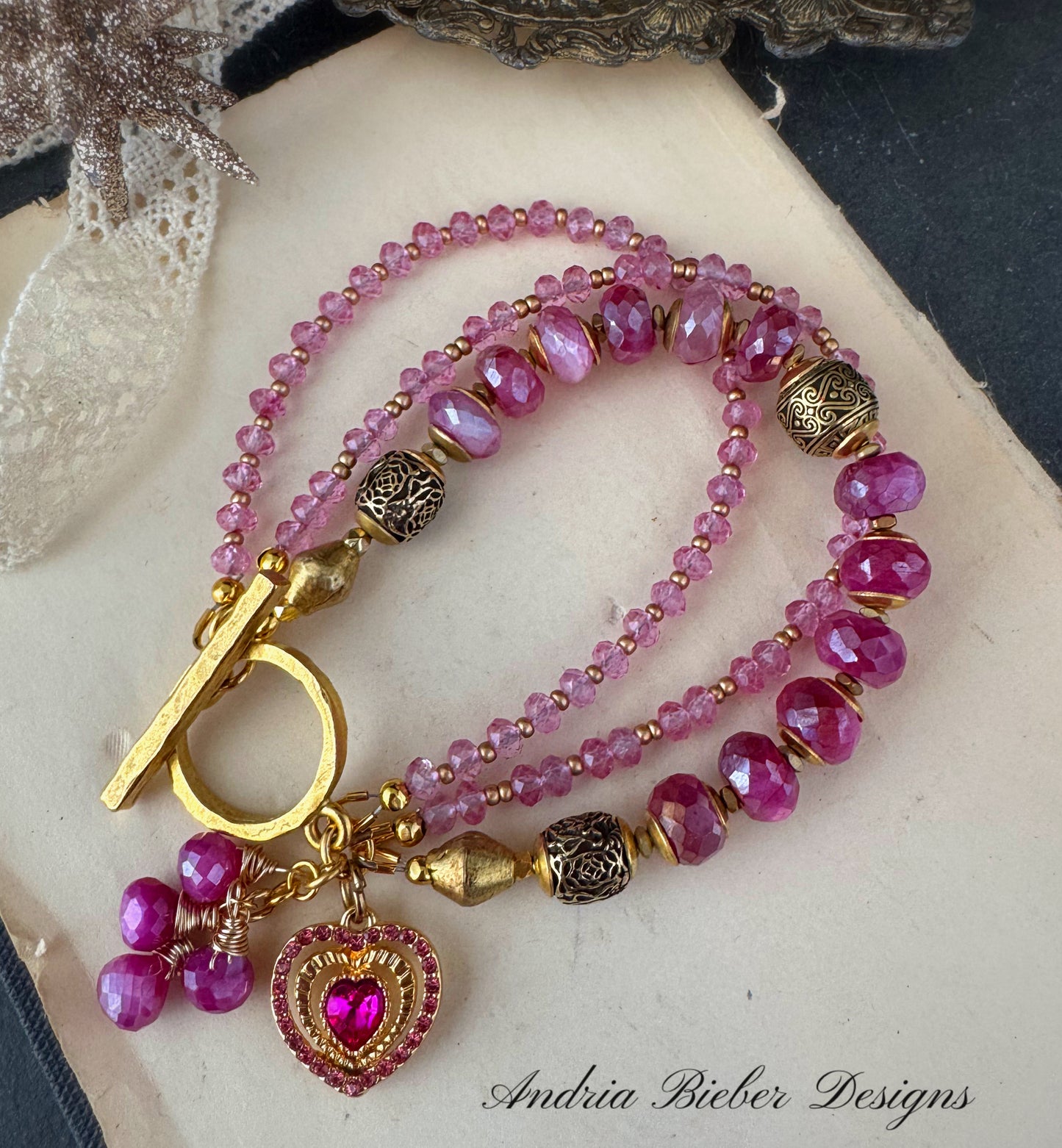 Pink moonstone, pink tourmaline gemstone, gold metal, bracelet, jewelry