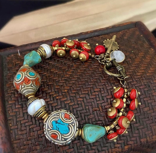 Nepal bliss. Pearl beads, Indonesian glass, nepal beads, czech glass and bronze metal bracelet.