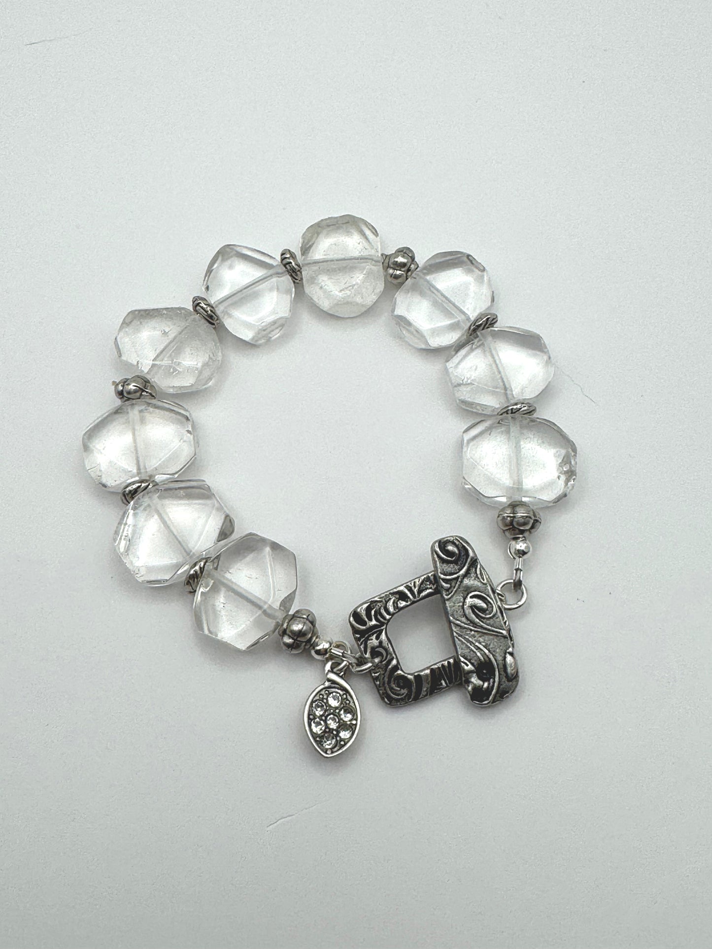 silver metal, rhinestone charm, clear quartz stone, bracelet.